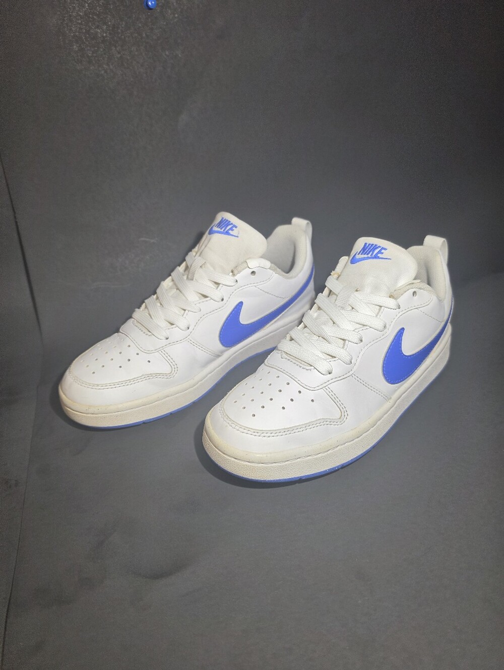 Nike KidsWhite Sneakers with Blue Swoosh Accent
